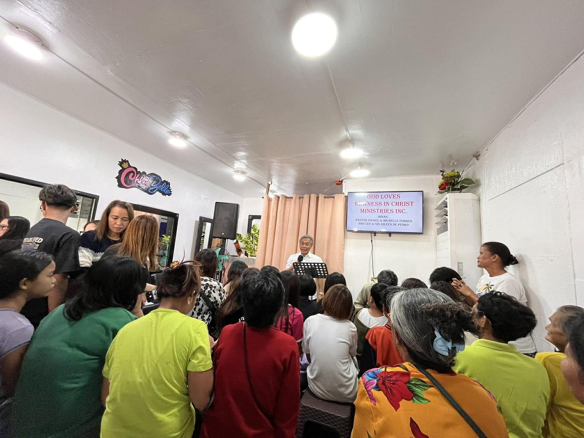 Pastor Ric preaching to a full room at the Newness in Christ Ministries Sunday service in Biñan